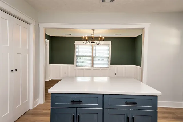 a bathroom with a sink and a window