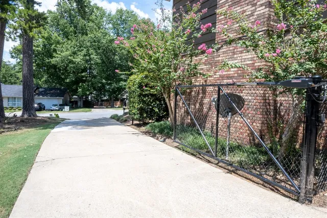 a house with trees in front of it