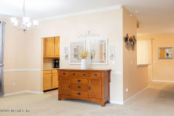 a spacious bathroom with a double vanity sink a mirror and a shower