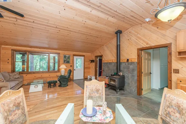 a kitchen with a sink a counter top space cabinets and appliances