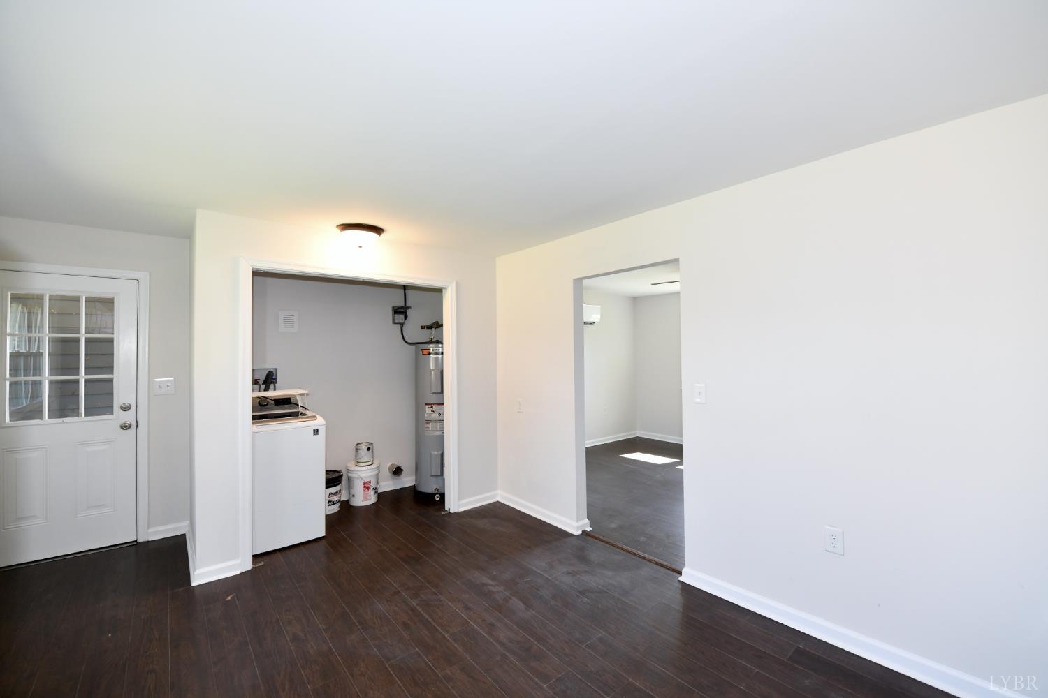 5763 3 Creeks Road Gladys, VA 24554 - Photo 16 of 25 an empty room with wooden floor and bathroom