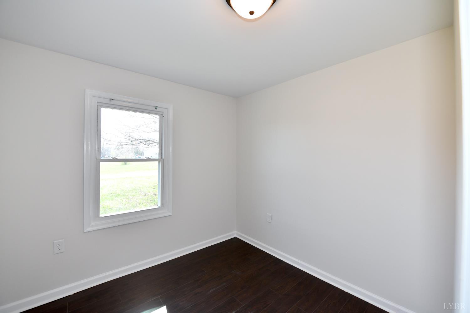 5763 3 Creeks Road Gladys, VA 24554 - Photo 22 of 25 an empty room with a window