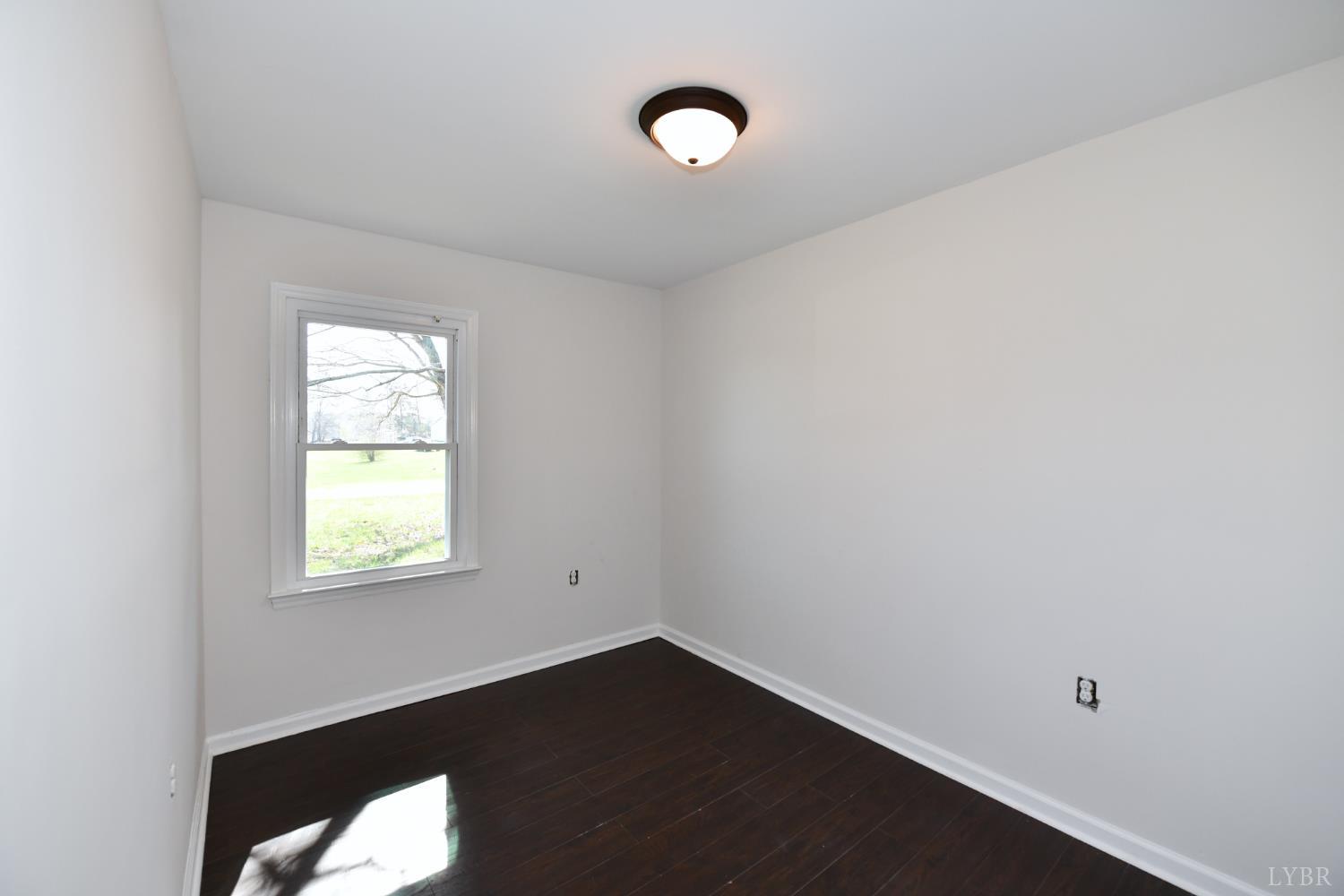 5763 3 Creeks Road Gladys, VA 24554 - Photo 24 of 25 a view of an empty room with a window