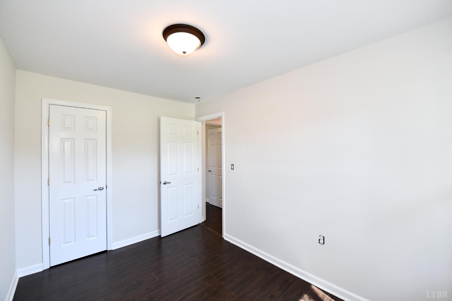 5763 3 Creeks Road Gladys, VA 24554 - Photo 25 of 25 a view of a room with wooden floor