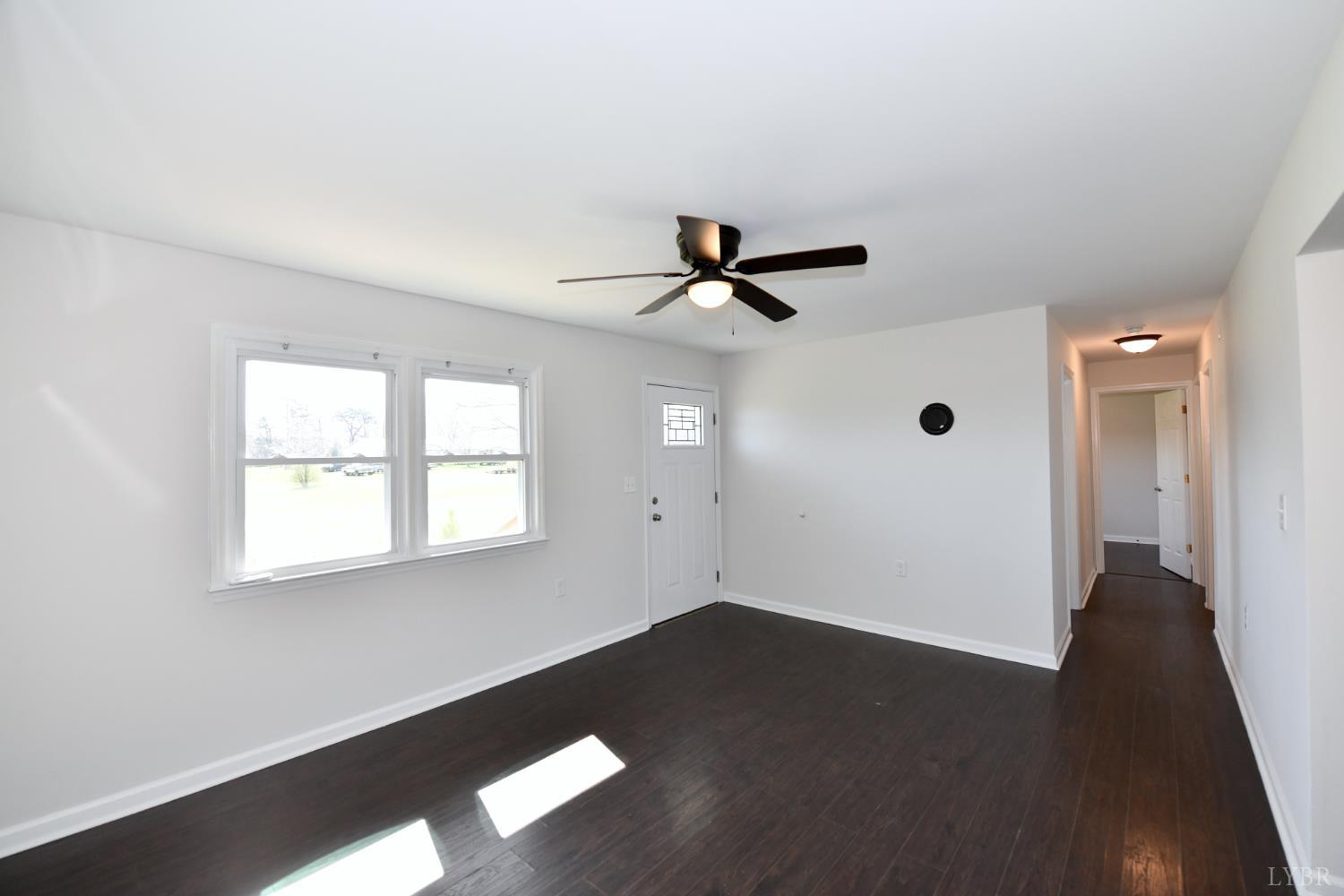5763 3 Creeks Road Gladys, VA 24554 - Photo 7 of 25 a view of empty room with wooden floor and fan