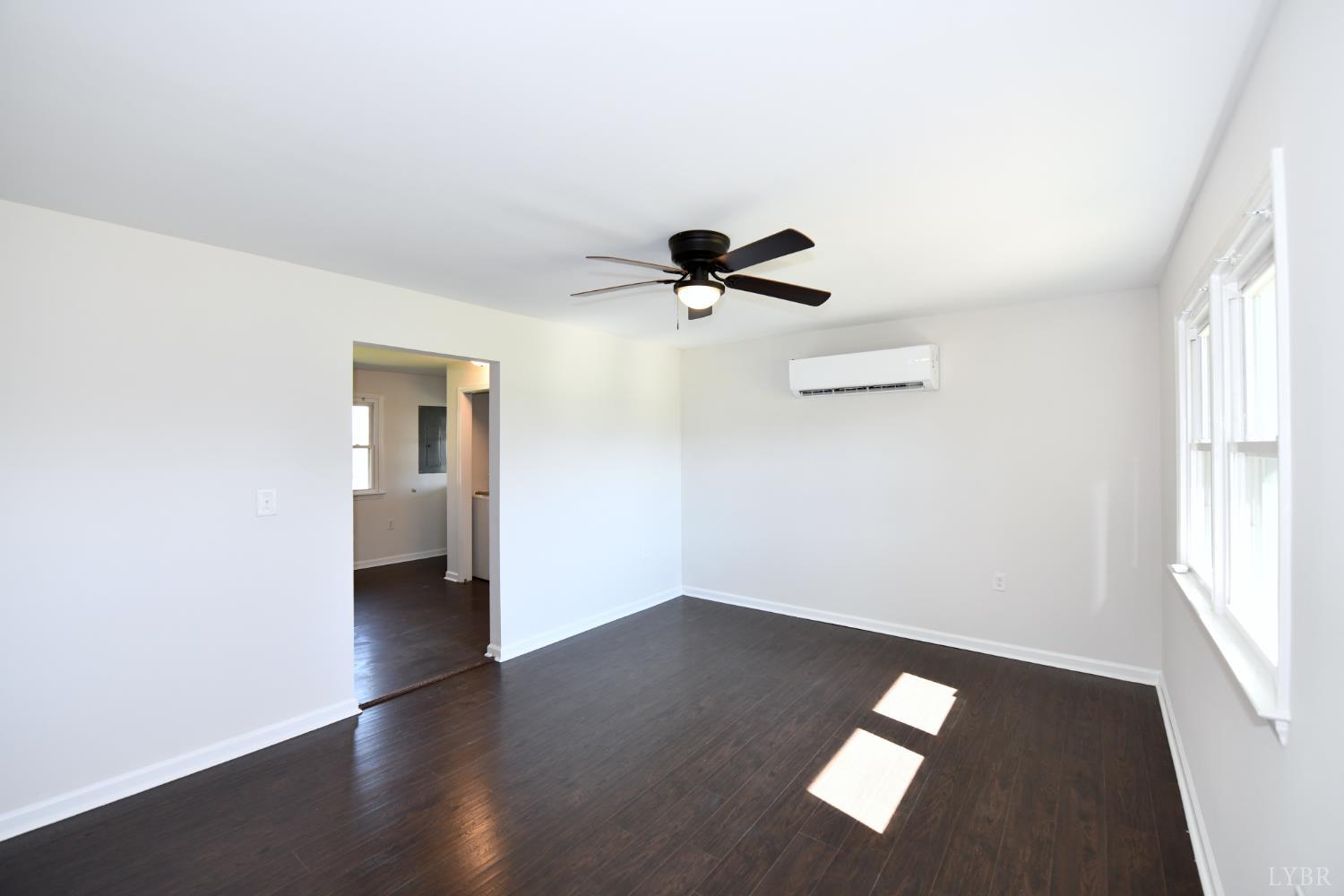5763 3 Creeks Road Gladys, VA 24554 - Photo 8 of 25 wooden floor in an empty room with a window