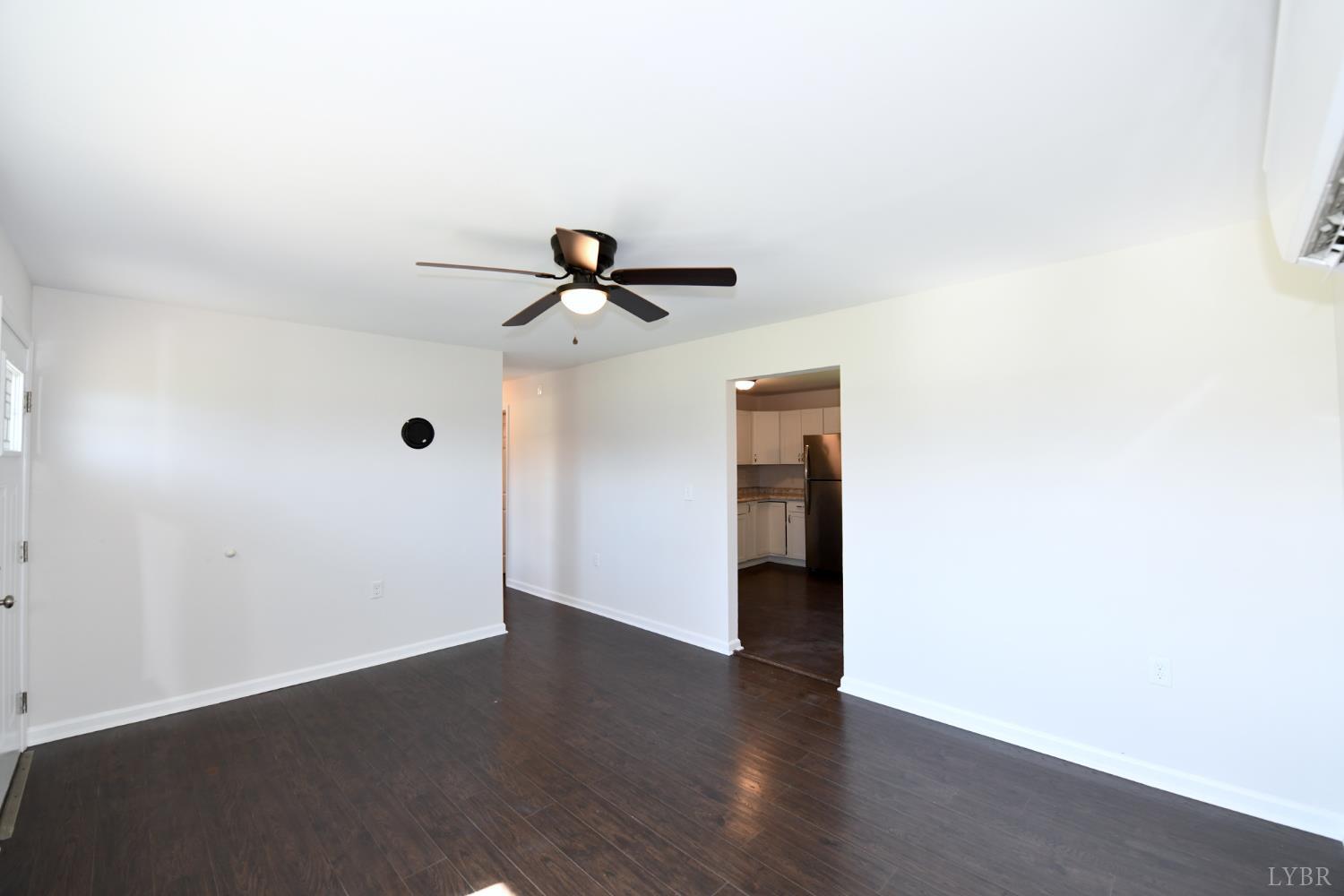 5763 3 Creeks Road Gladys, VA 24554 - Photo 9 of 25 a view of a livingroom with wooden floor