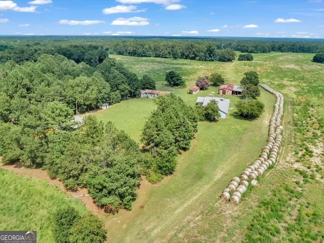 a view of a lake with a building in the background