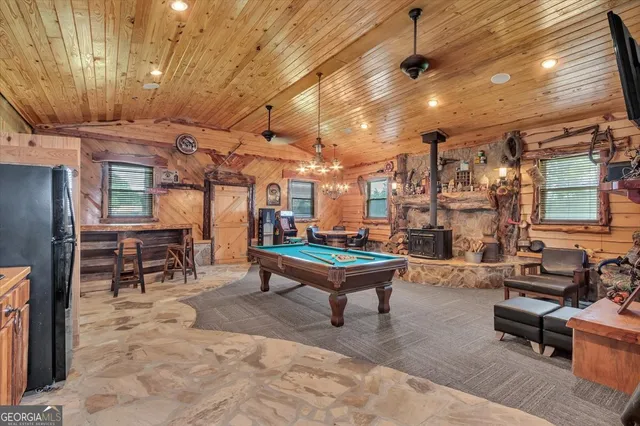 a view of living room with furniture and a window