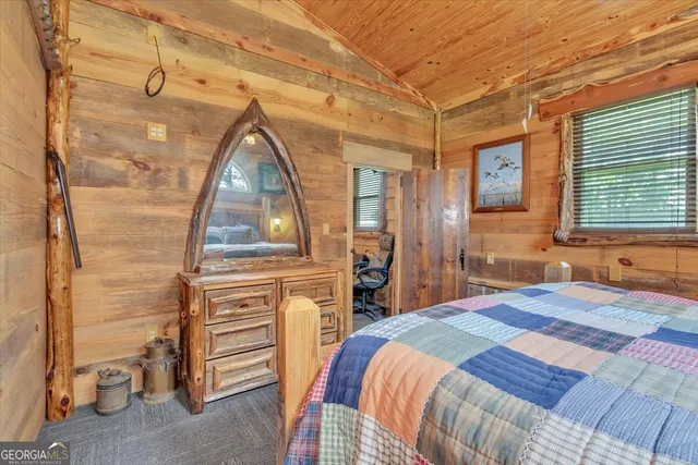 a bedroom with a bed and a closet