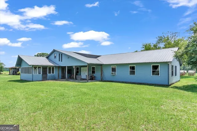 a bedroom with a bed and painted walls