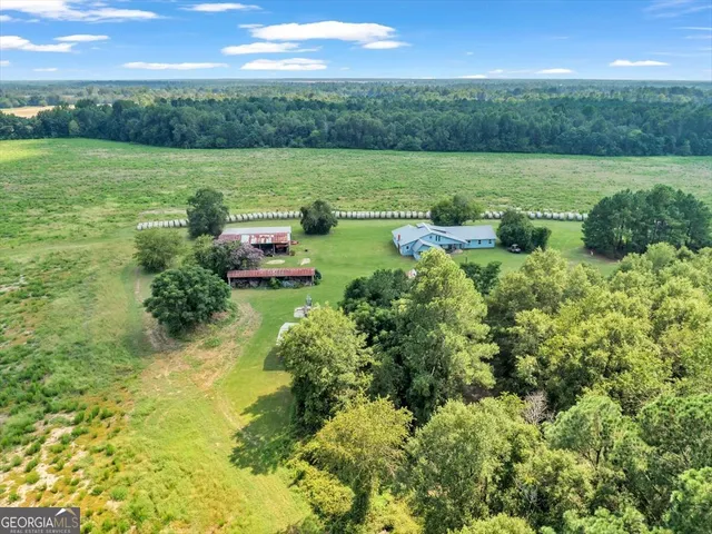 a view of a lake with a big yard