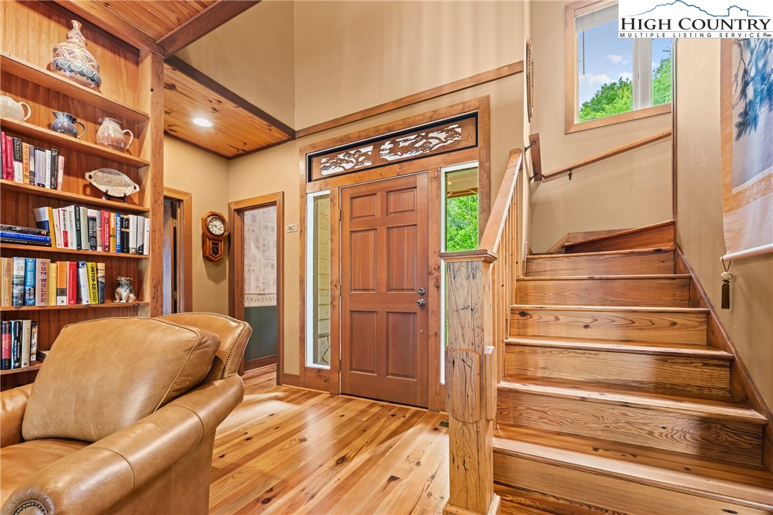349 Belmont Drive Boone, NC 28607 - Photo 25 of 49 a bedroom with a bed and a book shelf