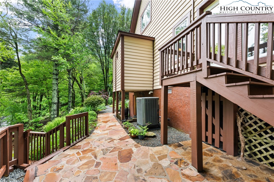 349 Belmont Drive Boone, NC 28607 - Photo 41 of 49 a view of a house with backyard and deck