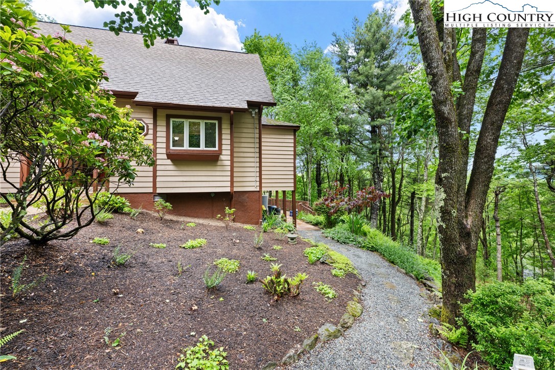 349 Belmont Drive Boone, NC 28607 - Photo 5 of 49 a view of a house with a backyard
