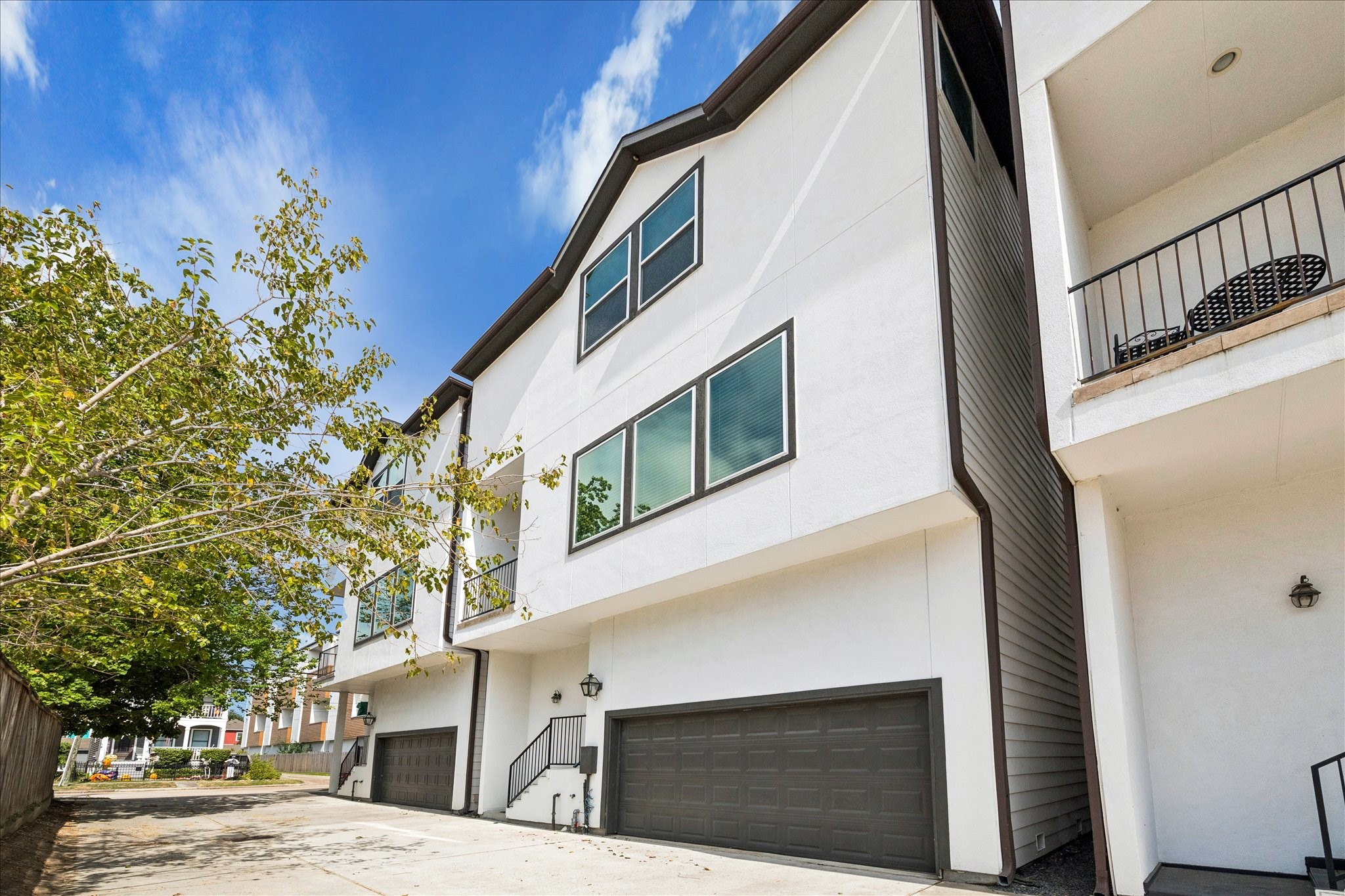 a view of a house with a street