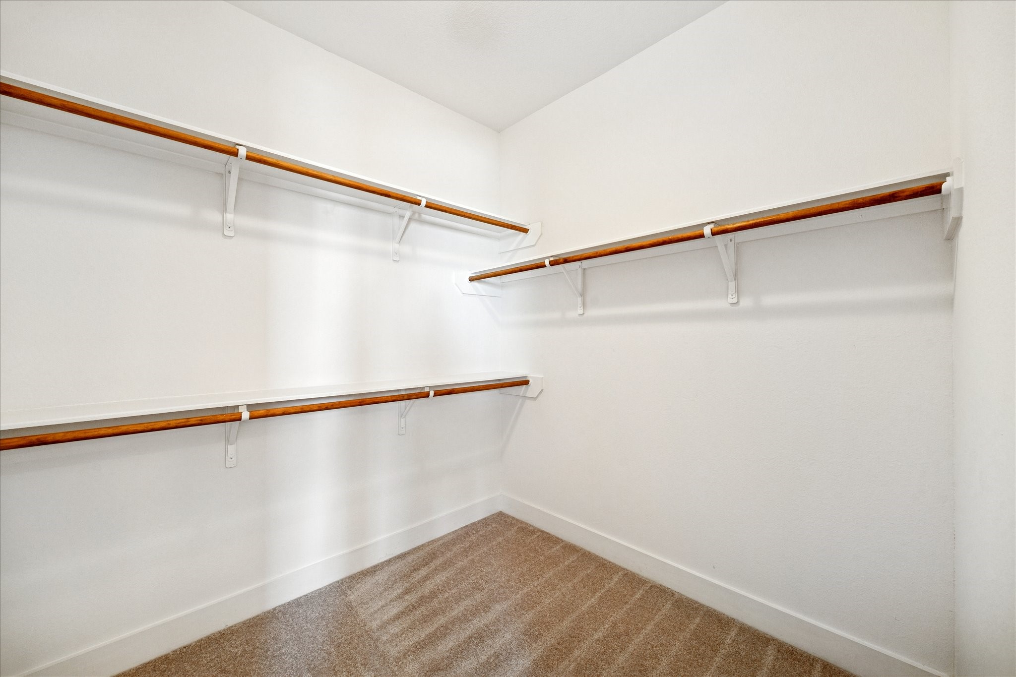 1546 West 23rd Street Houston, TX 77008 - Photo 14 of 20 a view of a room with racks on the wall