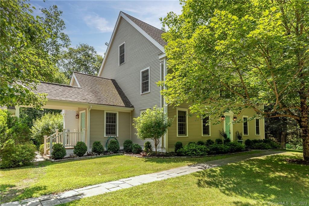 129 Headquarters Road Litchfield, CT 06759 - Photo 1 of 1 a front view of a house with a yard