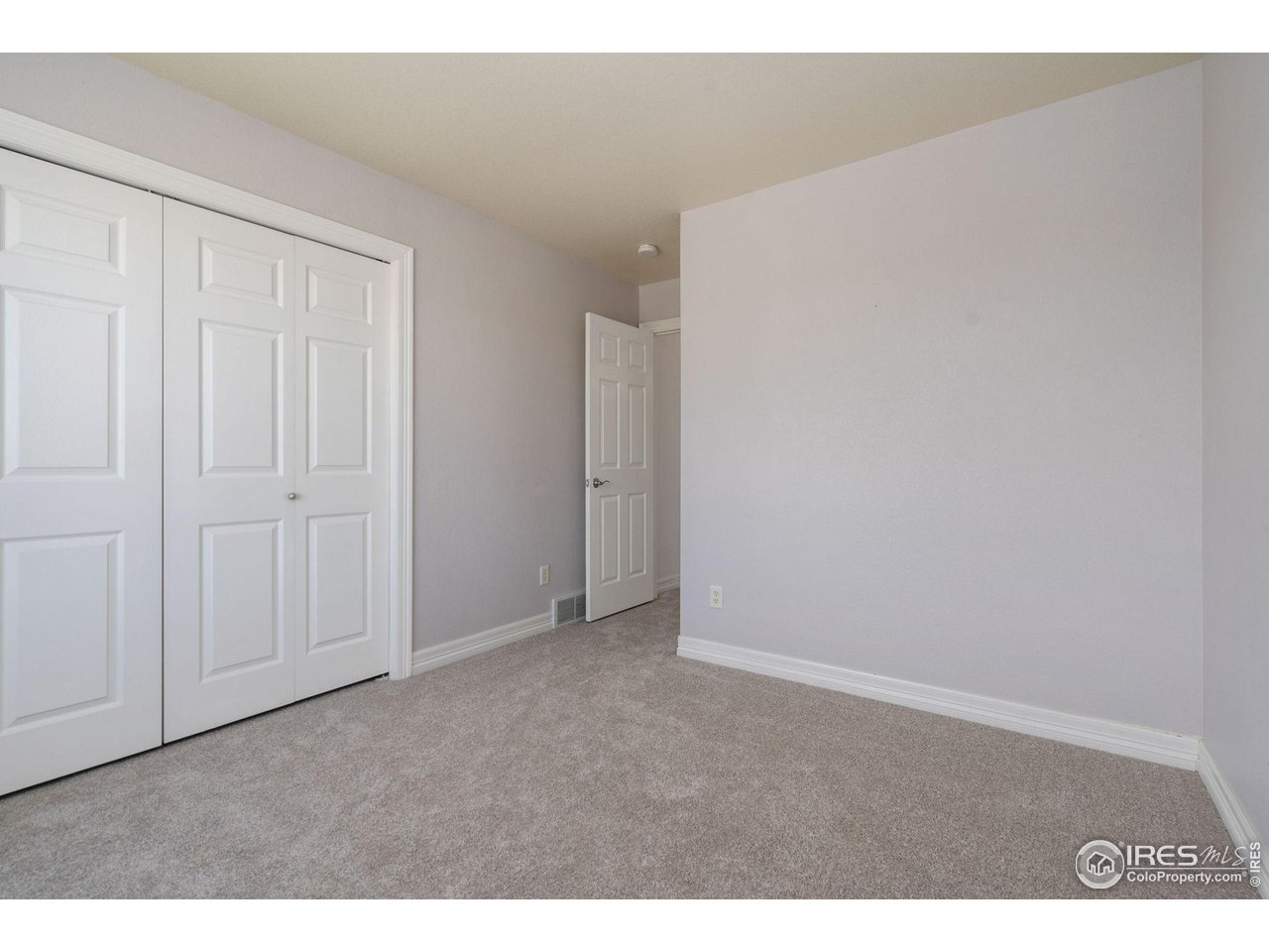 1424 Red Tail Road Eaton, CO 80615 - Photo 23 of 35 Second Bedroom
