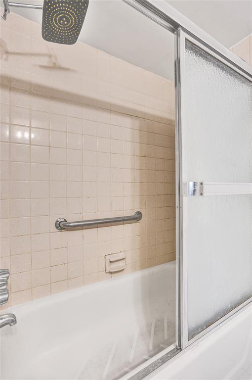 9273 Southwest 8th Street, Unit 117 Boca Raton, FL 33428 - Photo 22 of 40 a bathroom with a shower