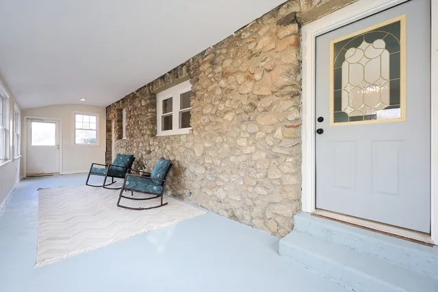 a view of livingroom with furniture and window