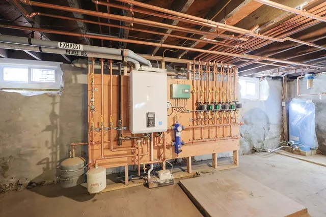 a view of a patio with table and chairs