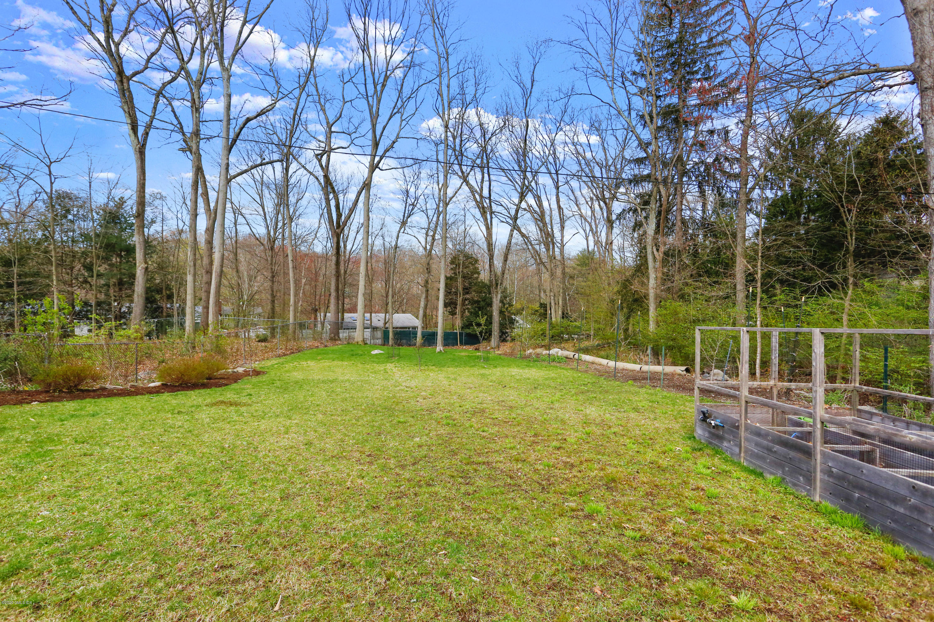 159 East Rocks Road, Unit 159 Norwalk, CT 06851 - Photo 27 of 32 a view of yard with green space