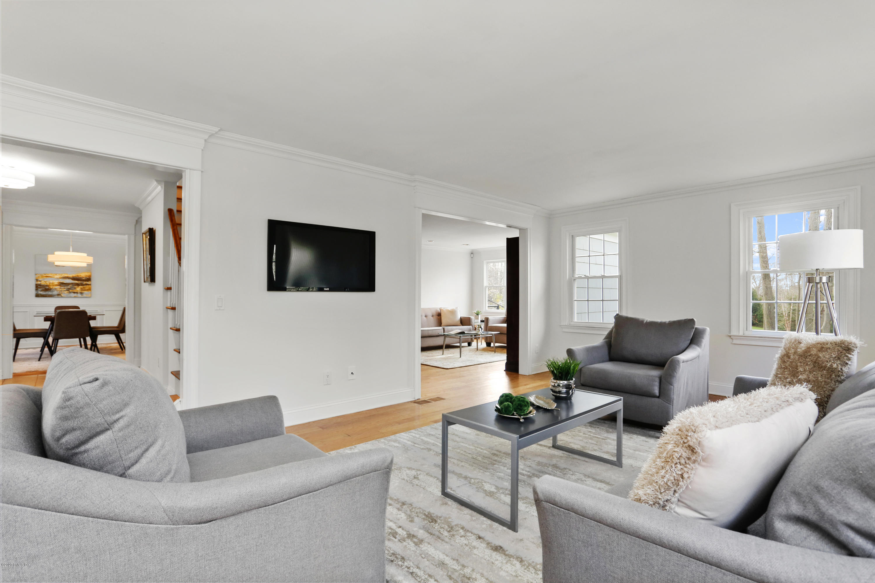 159 East Rocks Road, Unit 159 Norwalk, CT 06851 - Photo 5 of 32 a living room with furniture and a flat screen tv