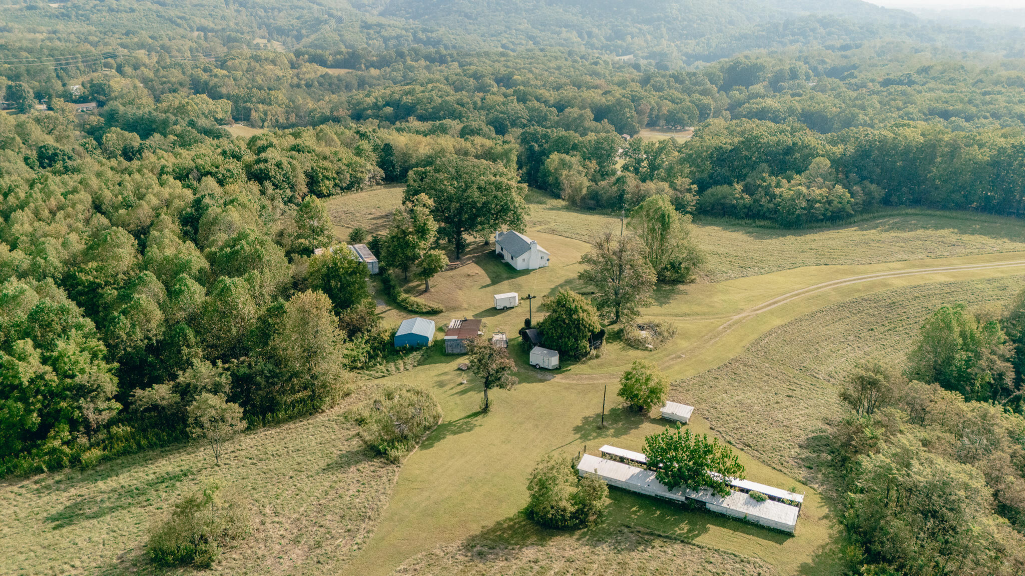 1737 Beagle Club Road Vinton, VA 24179 - Photo 16 of 45 an aerial view of a house with a yard and lake view