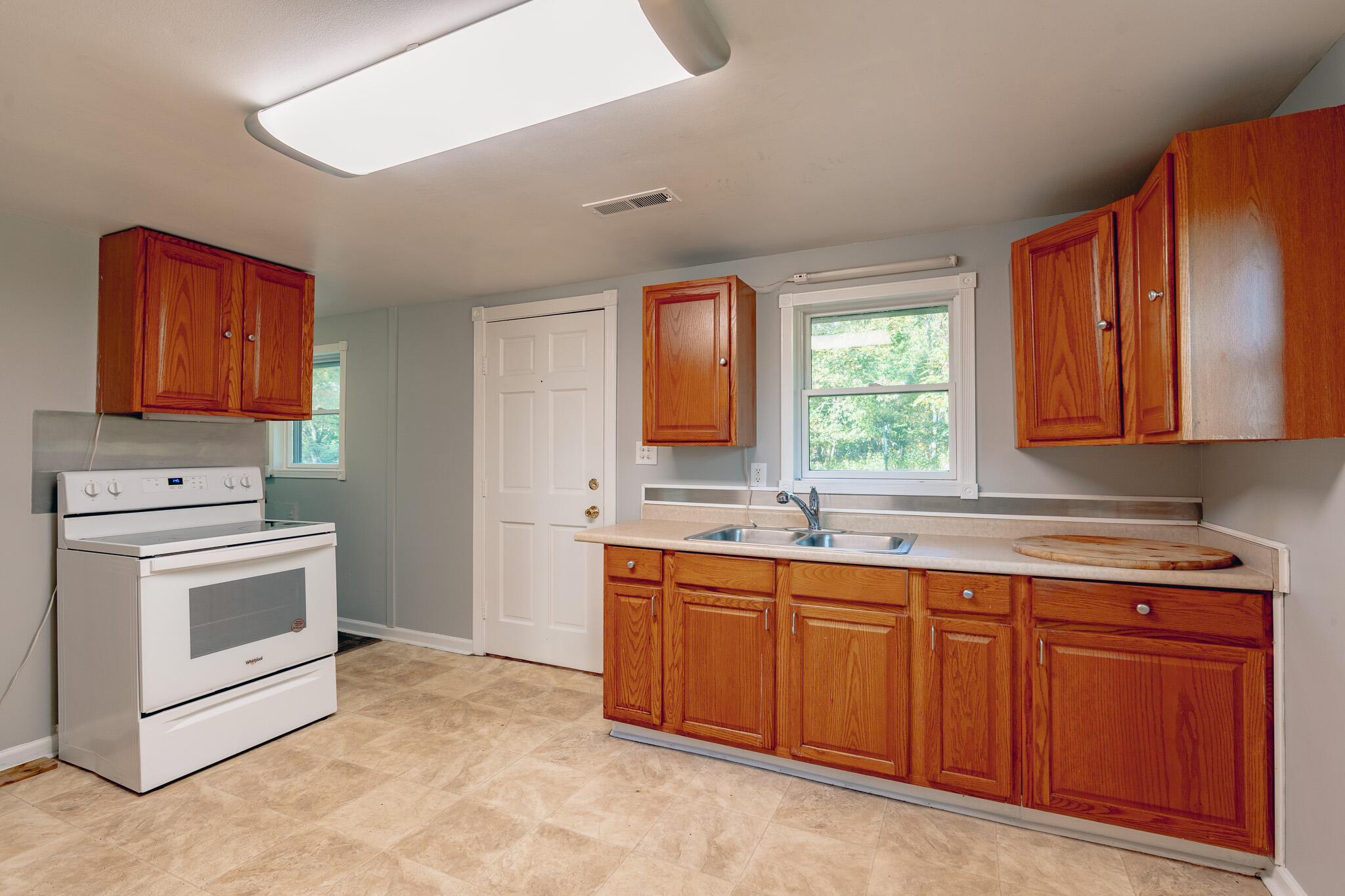 1737 Beagle Club Road Vinton, VA 24179 - Photo 32 of 45 a kitchen with sink a stove and oven