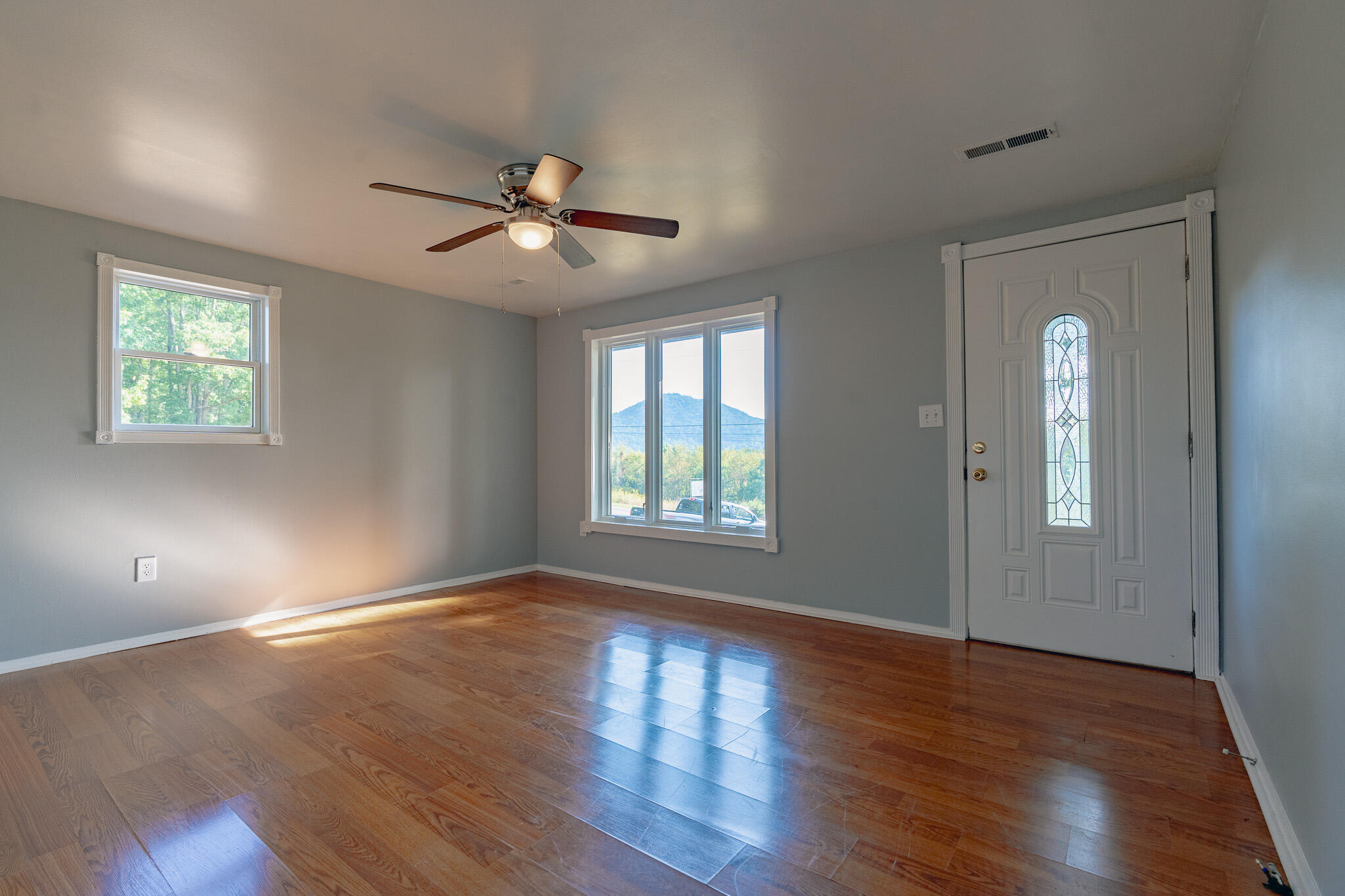 1737 Beagle Club Road Vinton, VA 24179 - Photo 33 of 45 a view of empty room with wooden floor and fan