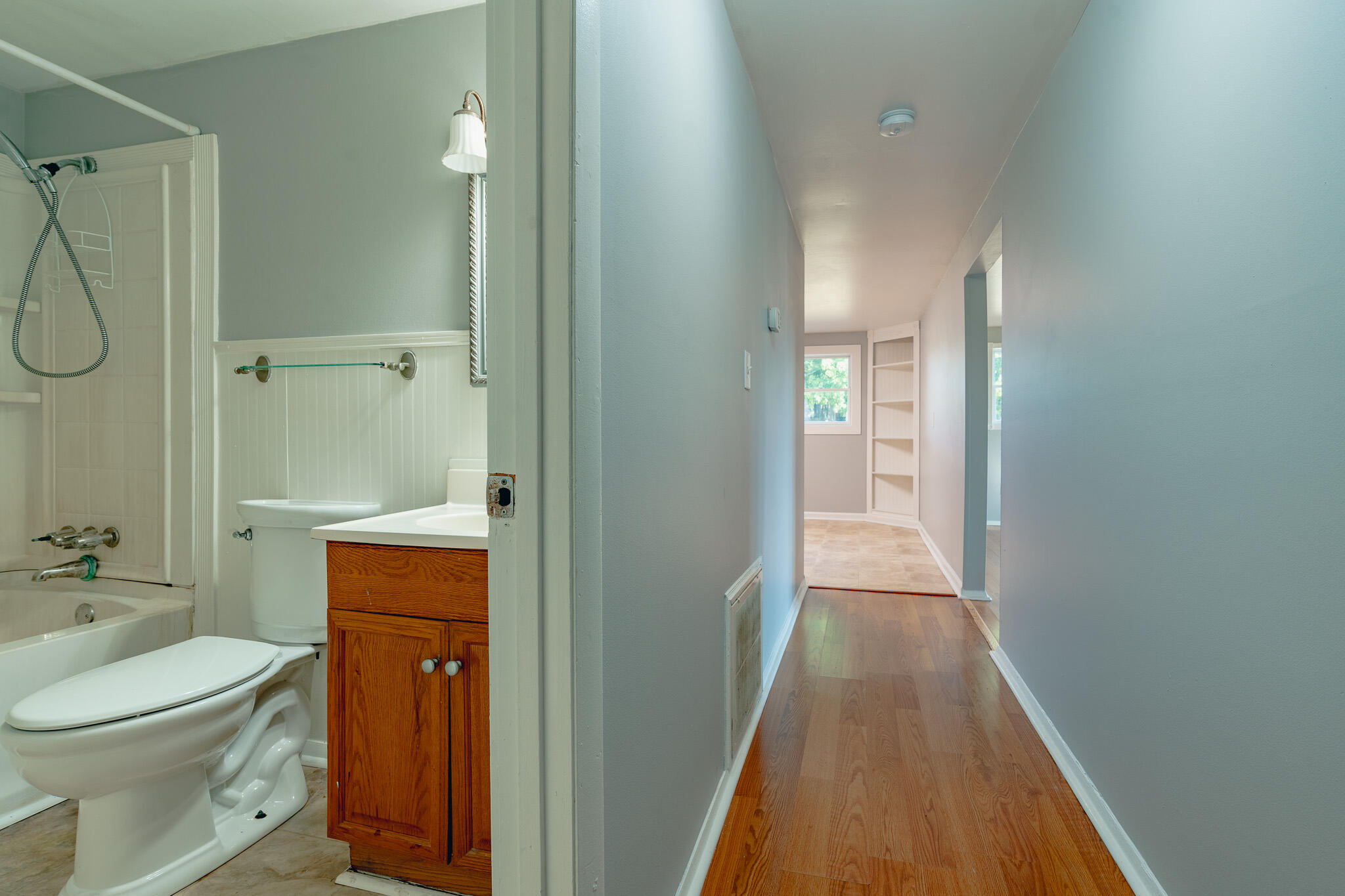 1737 Beagle Club Road Vinton, VA 24179 - Photo 35 of 45 a bathroom with a toilet a sink and shower