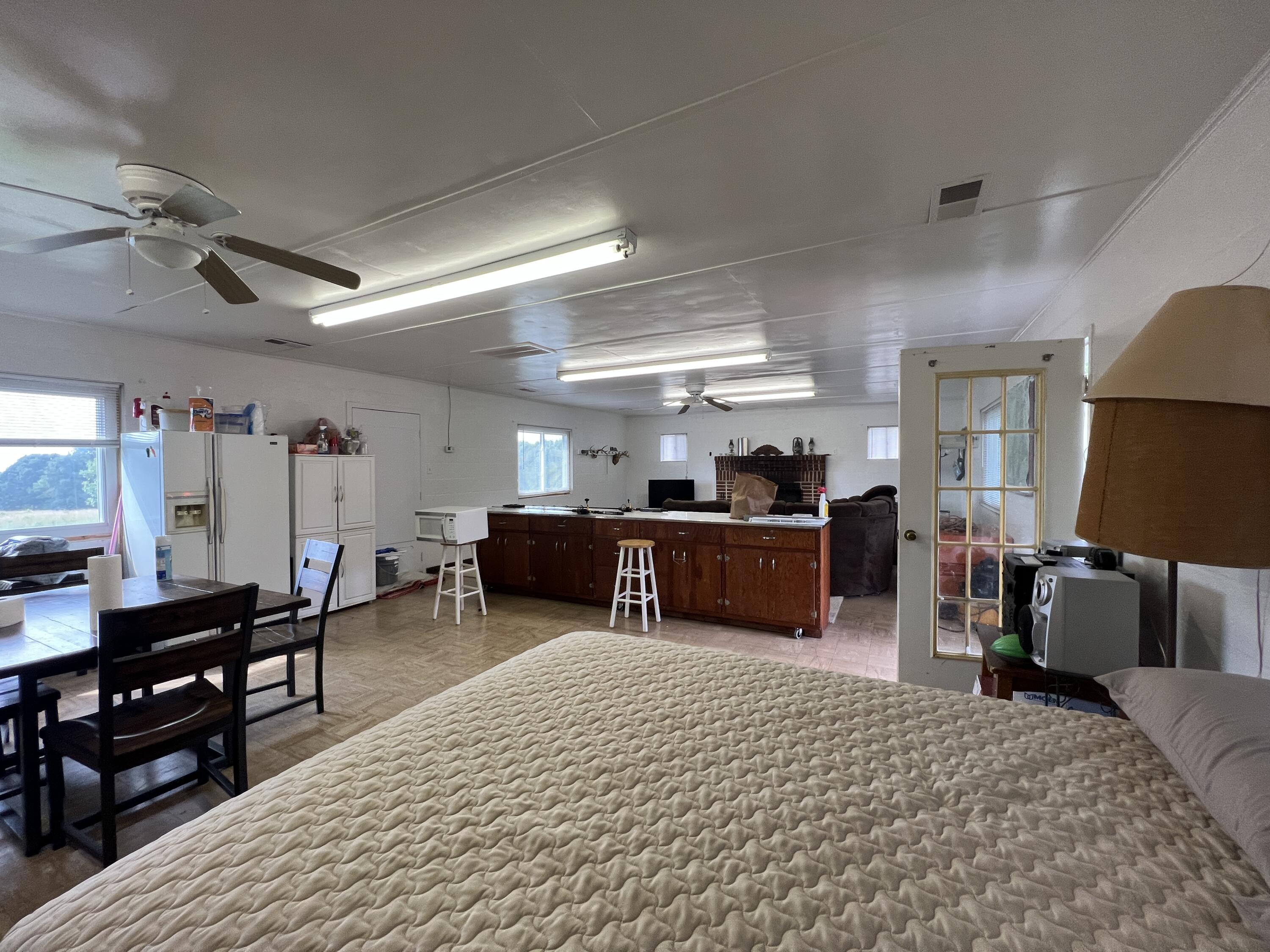 1737 Beagle Club Road Vinton, VA 24179 - Photo 42 of 45 a bed room with furniture and a chandelier