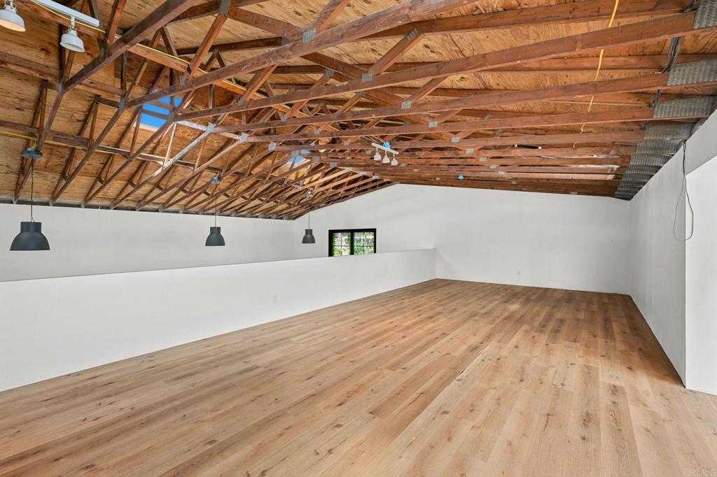 838 East Mission Road Fallbrook, CA 92028 - Photo 14 of 48 a view of empty room with wooden floor