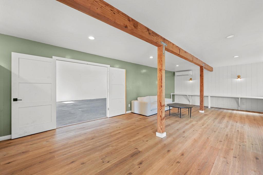 838 East Mission Road Fallbrook, CA 92028 - Photo 19 of 48 a view of a livingroom with furniture and wooden floor