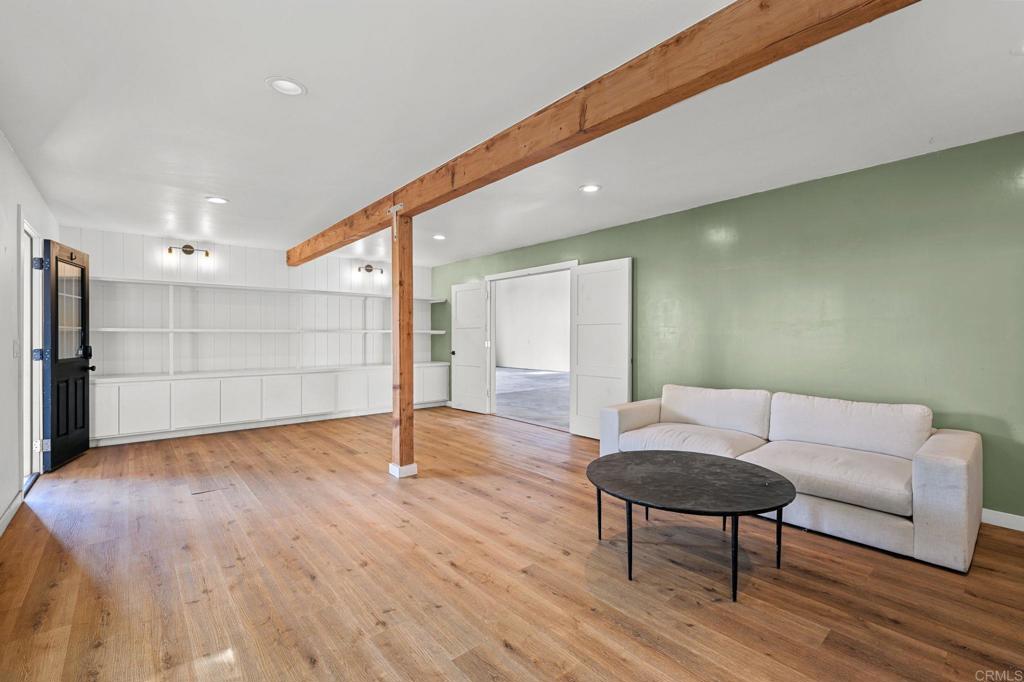 838 East Mission Road Fallbrook, CA 92028 - Photo 20 of 48 a living room with furniture and a wooden floor