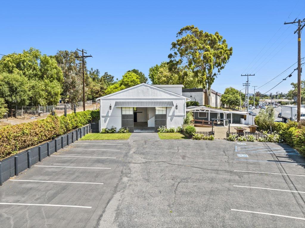 838 East Mission Road Fallbrook, CA 92028 - Photo 26 of 48 a view of a house with backyard and a garden