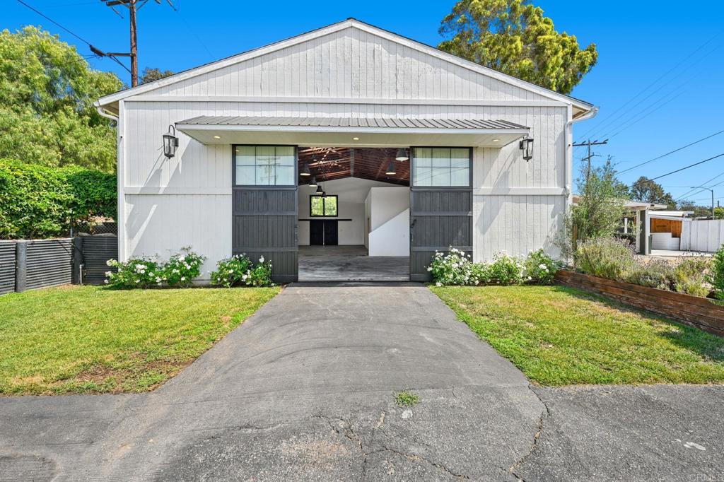 838 East Mission Road Fallbrook, CA 92028 - Photo 28 of 48 a front view of a house with a yard