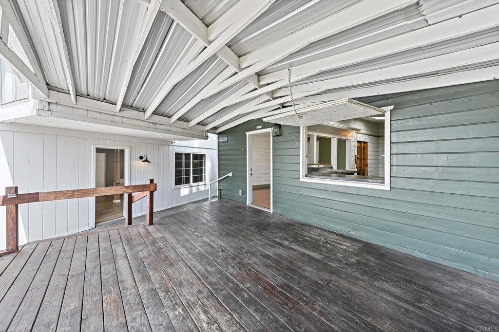 838 East Mission Road Fallbrook, CA 92028 - Photo 5 of 48 a view of outdoor space with deck and flat screen tv