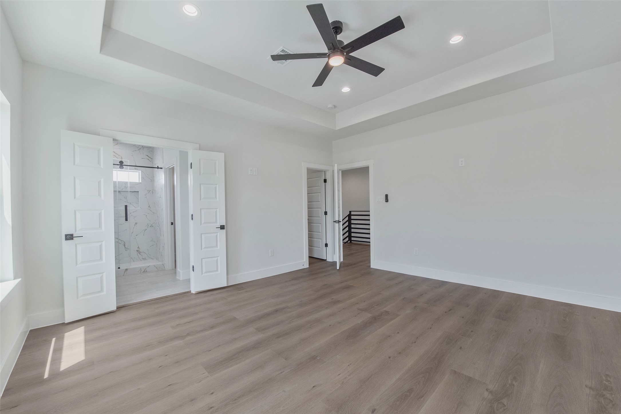 9311 Jutland Road Houston, TX 77033 - Photo 19 of 28 A large, light-filled bedroom offers a bright and comfortable retreat.