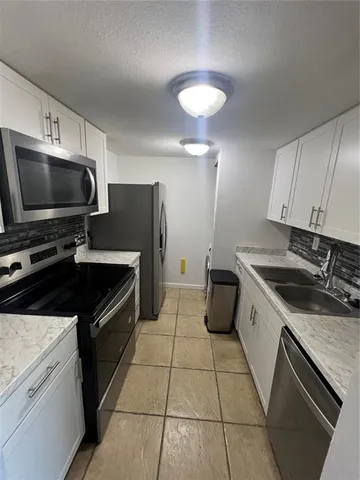 a balcony with view of car parked