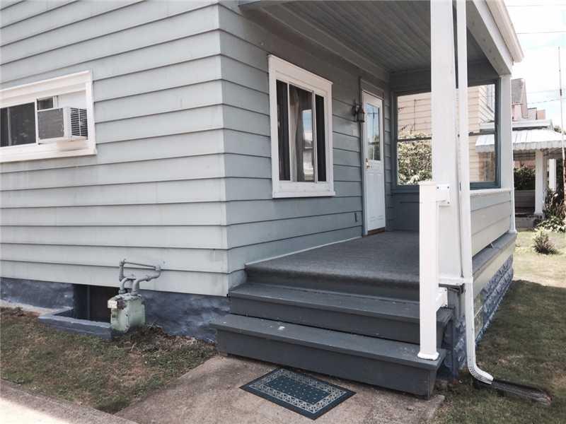 104 2nd Street Spring Mills, PA 16875 - Photo 22 of 25 Patio/Deck. Such a nice large front porch to just sit and relax.
