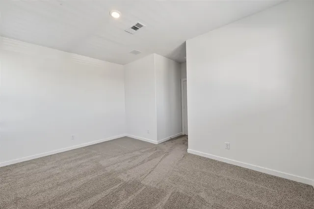 a bathroom with a bathtub and a toilet