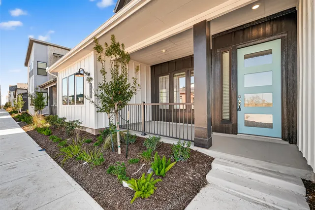 a front view of a house with a porch