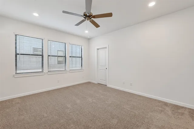 a bathroom with a double vanity sink mirror and shower
