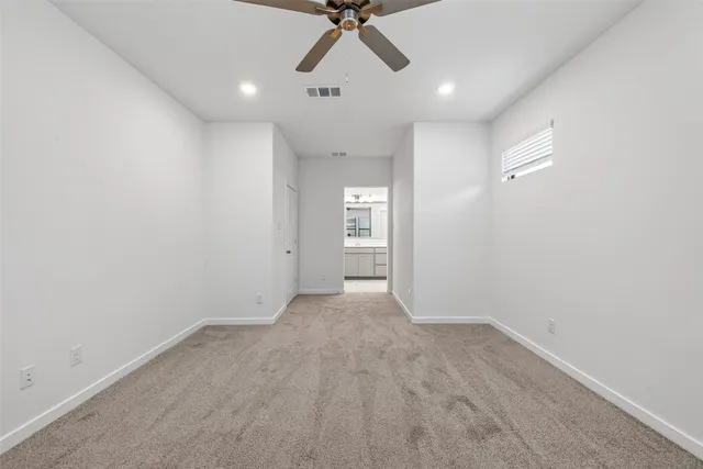 a bathroom with a shower sink and mirror