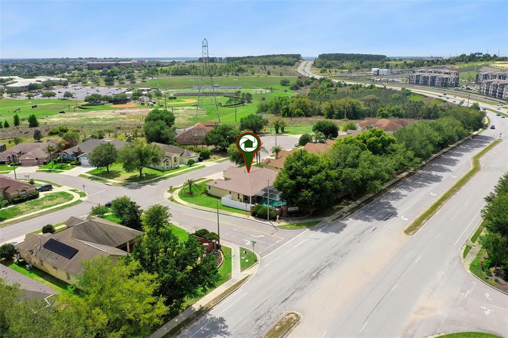 2440 Holly Ridge Court Clermont, FL 34711 - Photo 21 of 43 an aerial view of residential houses with outdoor space and river