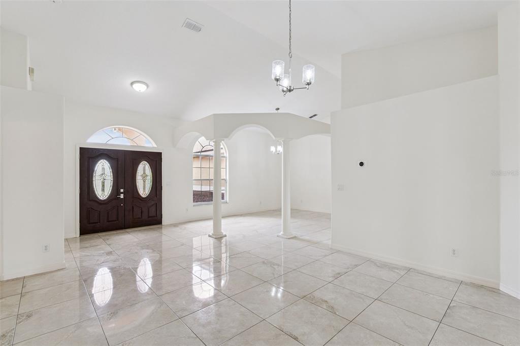 2440 Holly Ridge Court Clermont, FL 34711 - Photo 26 of 43 a view of a livingroom with furniture