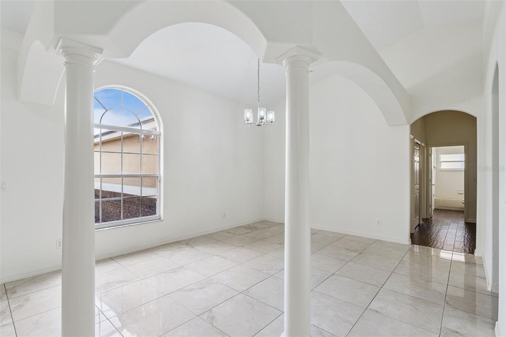 2440 Holly Ridge Court Clermont, FL 34711 - Photo 27 of 43 a view of an empty room with cabinet and a window