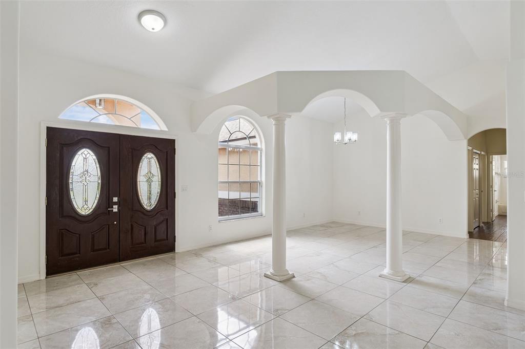2440 Holly Ridge Court Clermont, FL 34711 - Photo 4 of 43 a view of an entryway with a door